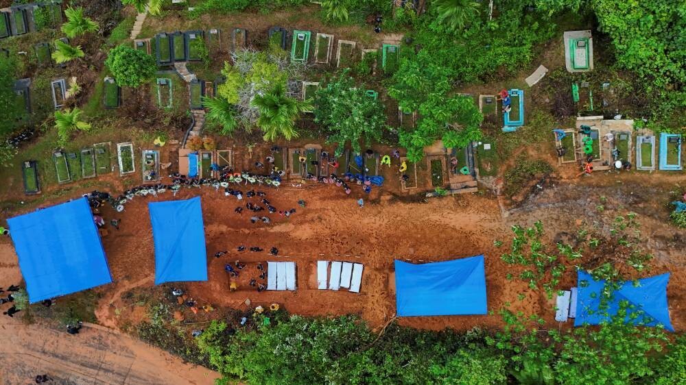 Devastating floods in Indonesia kill 990